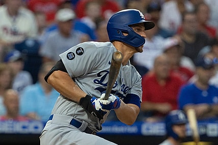 Aug 11, 2021; Philadelphia, Pennsylvania, USA; Los Angeles Dodgers shortstop Corey Seager (5) hits a single against the Philadelphia Phillies during the first inning at Citizens Bank Park. Mandatory Credit: Bill Streicher-USA TODAY Sports