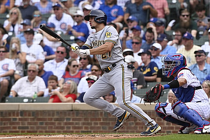 Aug 12, 2021; Chicago, Illinois, USA; Milwaukee Brewers shortstop Willy Adames (27) hits a two-RBI single against the Chicago Cubs during the second inning at Wrigley Field. Mandatory Credit: Matt Marton-USA TODAY Sports