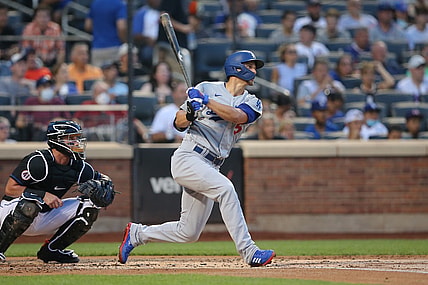 Aug 13, 2021; New York City, NY, USA; Los Angeles Dodgers shortstop Corey Seager (5) follows through on an RBI double against the New York Mets during the first inning at Citi Field. Mandatory Credit: Brad Penner-USA TODAY Sports