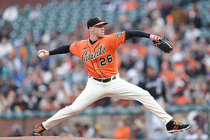 Aug 13, 2021; San Francisco, California, USA; San Francisco Giants starting pitcher Anthony DeSclafani (26) throws a pitch during the first inning against the Colorado Rockies at Oracle Park. Mandatory Credit: Sergio Estrada-USA TODAY Sports