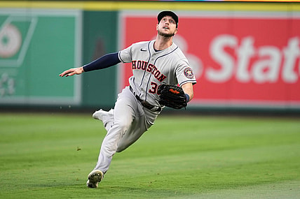 Aug 13, 2021; Anaheim, California, USA; Houston Astros right fielder Kyle Tucker (30) plays for the ball in the third inning against the Los Angeles Angels at Angel Stadium. Mandatory Credit: Kirby Lee-USA TODAY Sports