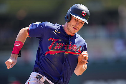 Aug 15, 2021; Minneapolis, Minnesota, USA; Minnesota Twins right fielder Max Kepler (26) rounds third and scores against the Tampa Bay Rays in the first inning at Target Field. Mandatory Credit: Brad Rempel-USA TODAY Sports