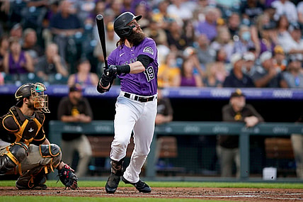 Aug 16, 2021; Denver, Colorado, USA; Colorado Rockies right fielder Charlie Blackmon (19) hits a two run home run in the third inning against the San Diego Padres at Coors Field. Mandatory Credit: Isaiah J. Downing-USA TODAY Sports
