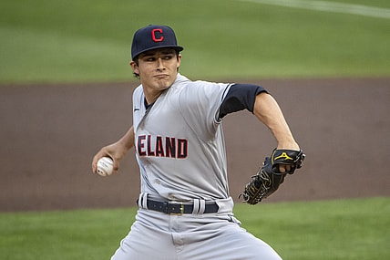 Aug 17, 2021; Minneapolis, Minnesota, USA; Cleveland Indians starting pitcher Eli Morgan (49) delivers a pitch in the first inning against the Minnesota Twins at Target Field. Mandatory Credit: Jesse Johnson-USA TODAY Sports