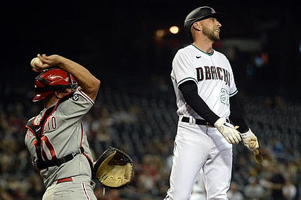 Aug 17, 2021; Phoenix, Arizona, USA; Arizona Diamondbacks pinch hitter Drew Ellis (27) reacts after striking out against the Philadelphia Phillies during the fifth inning at Chase Field. Mandatory Credit: Joe Camporeale-USA TODAY Sports