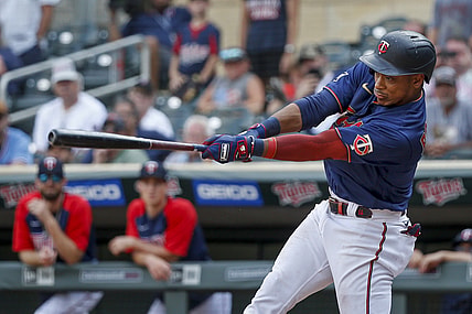 Aug 18, 2021; Minneapolis, Minnesota, USA; Minnesota Twins second baseman Jorge Polanco (11) hits an RBI single against the Cleveland Indians to win the game in the eleventh inning at Target Field. Mandatory Credit: Bruce Kluckhohn-USA TODAY Sports