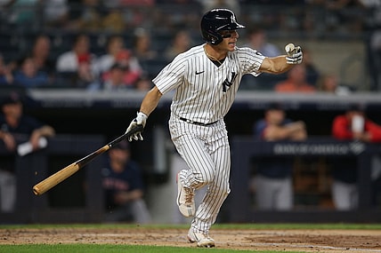 Aug 18, 2021; Bronx, New York, USA; New York Yankees shortstop Andrew Velazquez (71) follows through on an RBI single against the Boston Red Sox during the second inning at Yankee Stadium. Mandatory Credit: Brad Penner-USA TODAY Sports