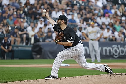 Aug 18, 2021; Chicago, Illinois, USA; Chicago White Sox starting pitcher Lance Lynn (33) delivers against the Oakland Athletics during the first inning at Guaranteed Rate Field. Mandatory Credit: Kamil Krzaczynski-USA TODAY Sports