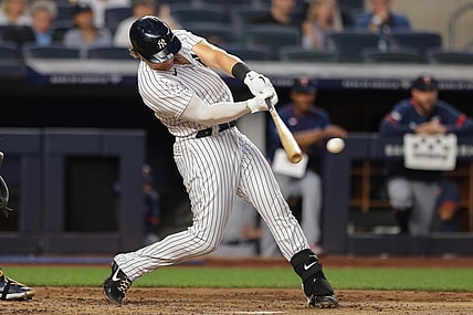 Aug 20, 2021; Bronx, New York, USA; New York Yankees first baseman Luke Voit (59) hits a single during the second inning against the Minnesota Twins at Yankee Stadium. Mandatory Credit: Vincent Carchietta-USA TODAY Sports