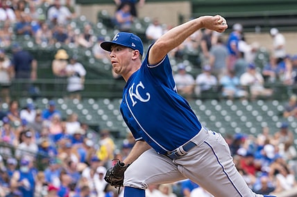 Aug 21, 2021; Chicago, Illinois, USA; Kansas City Royals starting pitcher Kris Bubic (50) pitches during the first inning against the Chicago Cubs at Wrigley Field. Mandatory Credit: Patrick Gorski-USA TODAY Sports