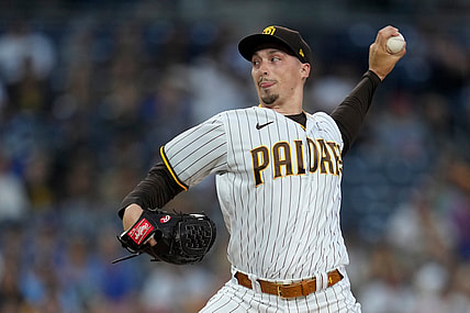Aug 25, 2021; San Diego, California, USA; San Diego Padres starting pitcher Blake Snell (4) pitches against the Los Angeles Dodgers in the first inning at Petco Park. Mandatory Credit: Ray Acevedo-USA TODAY Sports