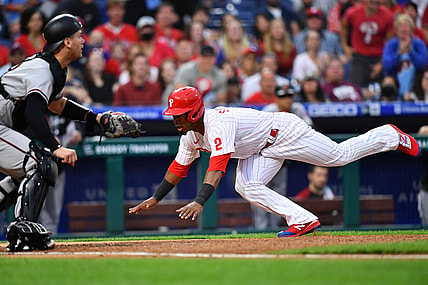 Aug 28, 2021; Philadelphia, Pennsylvania, USA; Philadelphia Phillies infielder Jean Segura (2) dives home to score in the first inning against the Arizona Diamondbacks at Citizens Bank Park. Mandatory Credit: Kyle Ross-USA TODAY Sports