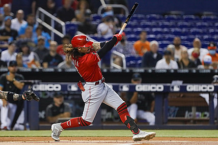 Aug 29, 2021; Miami, Florida, USA; Cincinnati Reds third baseman Jonathan India (6) connects for a base hit against the Miami Marlins during the first inning at loanDepot Park. Mandatory Credit: Sam Navarro-USA TODAY Sports