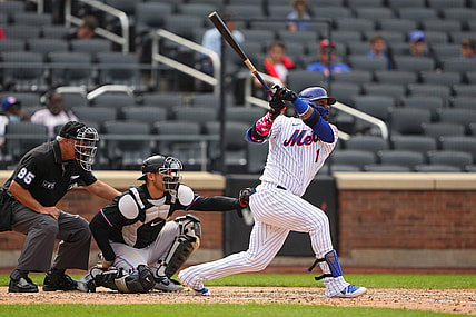 Aug 31, 2021; New York City, New York, USA; New York Mets third baseman Jonathan Villar (1) hits a home run during the fifth inning against the Miami Marlins at Citi Field. Mandatory Credit: Gregory Fisher-USA TODAY Sports