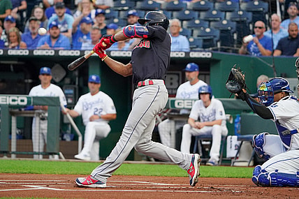 Aug 31, 2021; Kansas City, Missouri, USA; Cleveland Indians shortstop Amed Rosario (1) connects for a solo inside the park home run against the Kansas City Royals in the first inning at Kauffman Stadium. Mandatory Credit: Denny Medley-USA TODAY Sports