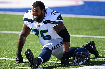 Nov 8, 2020; Orchard Park, New York, USA; Seattle Seahawks offensive tackle Duane Brown (76) stretches prior to the game against the Buffalo Bills at Bills Stadium. Mandatory Credit: Rich Barnes-USA TODAY Sports