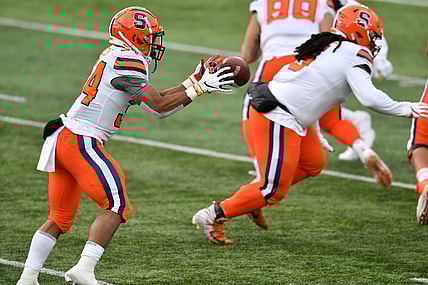 Dec 5, 2020; South Bend, Indiana, USA; Syracuse Orange running back Sean Tucker (34) takes a direct snap in the second quarter against the Notre Dame Fighting Irish at Notre Dame Stadium. Mandatory Credit: Matt Cashore-USA TODAY Sports