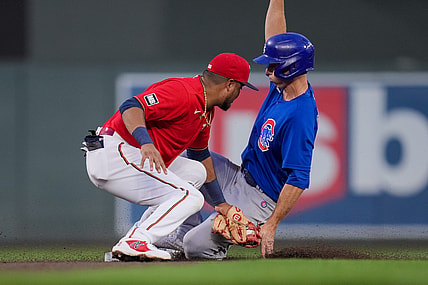 Aug 31, 2021; Minneapolis, Minnesota, USA; Chicago Cubs second baseman Matt Duffy (5) steals second base against the Minnesota Twins second baseman Luis Arraez (2) in the second inning at Target Field. Mandatory Credit: Brad Rempel-USA TODAY Sports