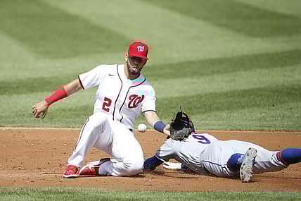 Sep 4, 2021; Washington, District of Columbia, USA; New York Mets center fielder Brandon Nimmo (9) steals second base ahead of a tag by Washington Nationals second baseman Luis Garcia (2) in the second inning at Nationals Park. Mandatory Credit: Amber Searls-USA TODAY Sports