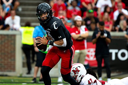Cincinnati Bearcats quarterback Desmond Ridder (9) is sacked by Miami Redhawks defensive lineman Lonnie Phelps (47) in the second half of the NCAA football game on Saturday, Sept. 4, 2021, at Nippert Stadium in Cincinnati. Cincinnati Bearcats defeated Miami Redhawks 49-14.

Cincinnati Bearcats Miami Redhawks