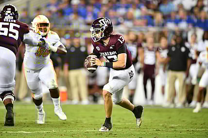 Sep 4, 2021;  College Station, Texas, USA;  Texas A&M Aggies quarterback Haynes King (13) runs the ball during the second quarter against the Kent State Golden Flashes at Kyle Field. Mandatory Credit: Maria Lysaker-USA TODAY Sports
