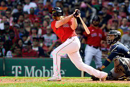 Sep 6, 2021; Boston, Massachusetts, USA; Boston Red Sox shortstop Taylor Motter (30) watches the ball after hitting an RBI double against the Tampa Bay Rays during the second inning at Fenway Park. Mandatory Credit: Brian Fluharty-USA TODAY Sports