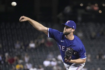 Sep 7, 2021; Phoenix, Arizona, USA; Texas Rangers starting pitcher Jordan Lyles (24) throws against the Arizona Diamondbacks in the first inning at Chase Field. Mandatory Credit: Rick Scuteri-USA TODAY Sports