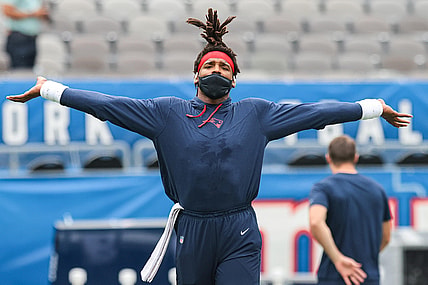 Aug 29, 2021; East Rutherford, New Jersey, USA; New England Patriots quarterback Cam Newton (1) warms up against the New York Giants before the game at MetLife Stadium. Mandatory Credit: Vincent Carchietta-USA TODAY Sports