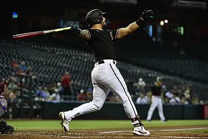 Sep 8, 2021; Phoenix, Arizona, USA; Arizona Diamondbacks left fielder David Peralta (6) hits a solo home run in the second inning against the Texas Rangers  at Chase Field. Mandatory Credit: Matt Kartozian-USA TODAY Sports