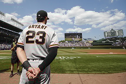 Sep 10, 2021; Chicago, Illinois, USA; San Francisco Giants third baseman Kris Bryant (23) watches a video tribute to him before a baseball game against the Chicago Cubs at Wrigley Field. Mandatory Credit: Kamil Krzaczynski-USA TODAY Sports