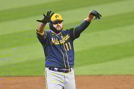 Sep 10, 2021; Cleveland, Ohio, USA; Milwaukee Brewers first baseman Rowdy Tellez (11) celebrates his double in the second inning against the Cleveland Indians at Progressive Field. Mandatory Credit: David Richard-USA TODAY Sports