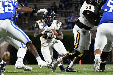 Sep 10, 2021; Durham, North Carolina, USA; North Carolina A&T Aggies running back Fredderick Graves (35) runs against the Duke Blue Devils during the first quarter at Wallace Wade Stadium. Mandatory Credit: William Howard-USA TODAY Sports