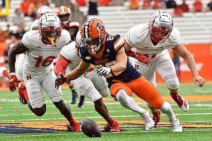 Sep 11, 2021; Syracuse, New York, USA; Syracuse Orange wide receiver Trebor Pena (29) goes to recover a muffed punt return as Rutgers Scarlet Knights defensive back Max Melton (16) and Rutgers Scarlet Knights long snapper Billy Taylor (47) come in during the second quarter at the Carrier Dome. Mandatory Credit: Mark Konezny-USA TODAY Sports