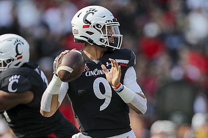 Sep 11, 2021; Cincinnati, Ohio, USA; Cincinnati Bearcats quarterback Desmond Ridder (9) throws a pass against the Murray State Racers in the first half at Nippert Stadium. Mandatory Credit: Katie Stratman-USA TODAY Sports