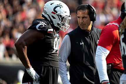 Cincinnati Bearcats head coach Luke Fickell talks to Cincinnati Bearcats defensive lineman Jabari Taylor (90) in the first half of the NCAA football game between Cincinnati Bearcats and Murray State Racers on Saturday, Sept. 11, 2021, at Nippert Stadium in Cincinnati.

Murray State Racers At Cincinnati Bearcats