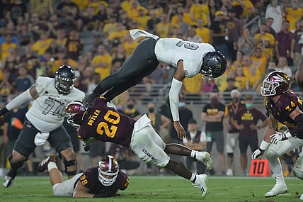 Sep 11, 2021; Tempe, Arizona, USA; UNLV Rebels quarterback Doug Brumfield (2) dives for a touchdown against the Arizona State Sun Devils during the first half at Sun Devil Stadium. Mandatory Credit: Joe Camporeale-USA TODAY Sports