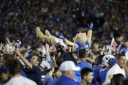 Sep 11, 2021; Provo, Utah, USA; Brigham Young Cougars mascot Cosmo body surfs as fans stormed the field after their win over the Utah Utes at LaVell Edwards Stadium. Mandatory Credit: Jeffrey Swinger-USA TODAY Sports