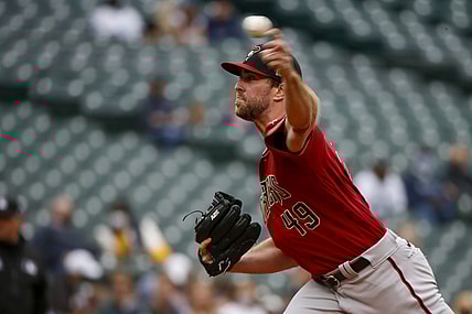 Sep 12, 2021; Seattle, Washington, USA; Arizona Diamondbacks starting pitcher Tyler Gilbert (49) throws against the Seattle Mariners during the first inning at T-Mobile Park. Mandatory Credit: Joe Nicholson-USA TODAY Sports