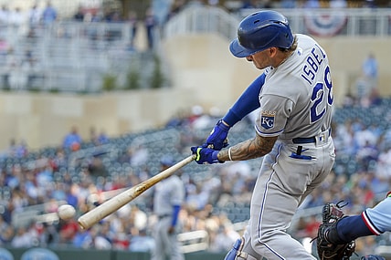 Sep 12, 2021; Minneapolis, Minnesota, USA; Kansas City Royals center fielder Kyle Isbel (28) hits an RBI single against the Minnesota Twins in the eighth inning at Target Field. Mandatory Credit: Bruce Kluckhohn-USA TODAY Sports