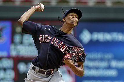 Sep 14, 2021; Minneapolis, Minnesota, USA; Cleveland Indians starting pitcher Triston McKenzie (24) throws to the Minnesota Twins in the second inning at Target Field. Mandatory Credit: Bruce Kluckhohn-USA TODAY Sports