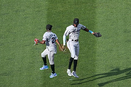 Sep 15, 2021; Washington, District of Columbia, USA; Miami Marlins second baseman Jazz Chisholm Jr. (2) celebrates with Marlins right fielder Lewis Brinson (25) after their game against the Washington Nationals at Nationals Park. Mandatory Credit: Geoff Burke-USA TODAY Sports