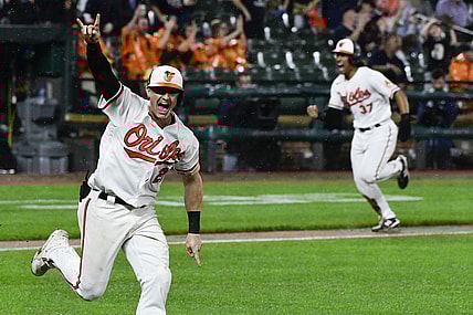 Sep 16, 2021; Baltimore, Maryland, USA;  Baltimore Orioles outfielder Austin Hayes hits a game winning single scoring second baseman Jahmai Jones during the tenth inning against the New York Yankeesat Oriole Park at Camden Yards. Mandatory Credit: Tommy Gilligan-USA TODAY Sports