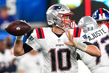 Aug 29, 2021; East Rutherford, New Jersey, USA; New England Patriots quarterback Mac Jones (10) attempts a pass against the New York Giants during the third quarter at MetLife Stadium. Mandatory Credit: Dennis Schneidler-USA TODAY Sports