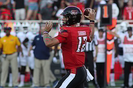Sep 18, 2021; Lubbock, Texas, USA; Texas Tech Red Raiders quarterback Tyler Shough (12) throws a pass against the Florida International Panthers in the first half at Jones AT&T Stadium. Mandatory Credit: Michael C. Johnson-USA TODAY Sports