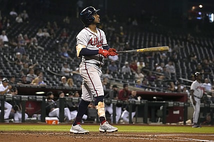 Sep 21, 2021; Phoenix, Arizona, USA; Atlanta Braves second baseman Ozzie Albies (1) hits a two run home run against the Arizona Diamondbacks in the third inning at Chase Field. Mandatory Credit: Rick Scuteri-USA TODAY Sports