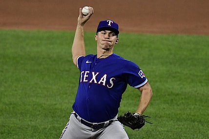 Sep 23, 2021; Baltimore, Maryland, USA; Texas Rangers starting pitcher Glenn Otto (49) delivers a third inning pitch against the Baltimore Orioles  at Oriole Park at Camden Yards. Mandatory Credit: Tommy Gilligan-USA TODAY Sports