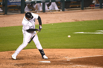 Sep 24, 2021; Detroit, Michigan, USA; Detroit Tigers designated hitter Miguel Cabrera (24) hits a single during the sixth inning against the Kansas City Royals at Comerica Park. Mandatory Credit: Tim Fuller-USA TODAY Sports