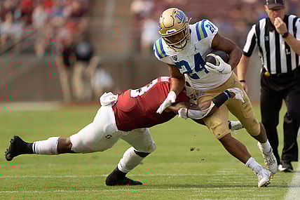 Sep 25, 2021; Stanford, California, USA;  Stanford Cardinal linebacker Levani Damuni (3) tackles UCLA Bruins running back Zach Charbonnet (24) during the first quarter at Stanford Stadium. Mandatory Credit: Stan Szeto-USA TODAY Sports