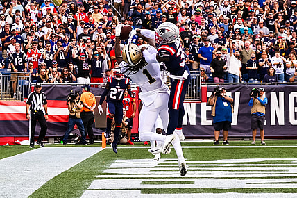 Sep 26, 2021; Foxborough, Massachusetts, USA; New Orleans Saints wide receiver Marquez Callaway (1) catches a touchdown against New England Patriots defensive back Jonathan Jones (31) during the first half at Gillette Stadium. Mandatory Credit: Stephen Lew-USA TODAY Sports