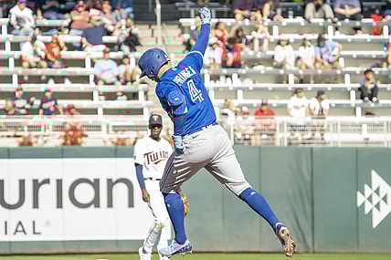 Sep 26, 2021; Minneapolis, Minnesota, USA; Toronto Blue Jays center fielder George Springer (4) hits a home run against Minnesota Twins starting pitcher Griffin Jax (83) at Target Field. Mandatory Credit: Matt Blewett-USA TODAY Sports